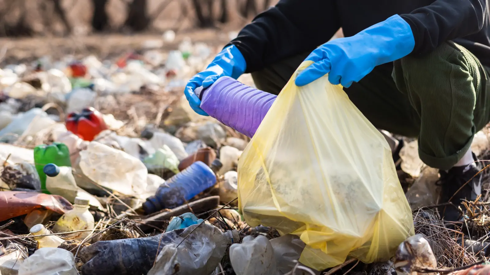 Sanitation professionals collecting and sorting waste for responsible disposal